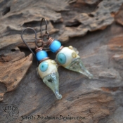 Lovely Lampwork headpins paired with beautiful bright turquoise glass beads.